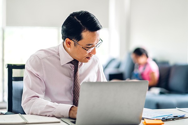 Business man working from a hybrid location on laptop