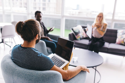 People at work in a relaxed environment with high speed connectivity